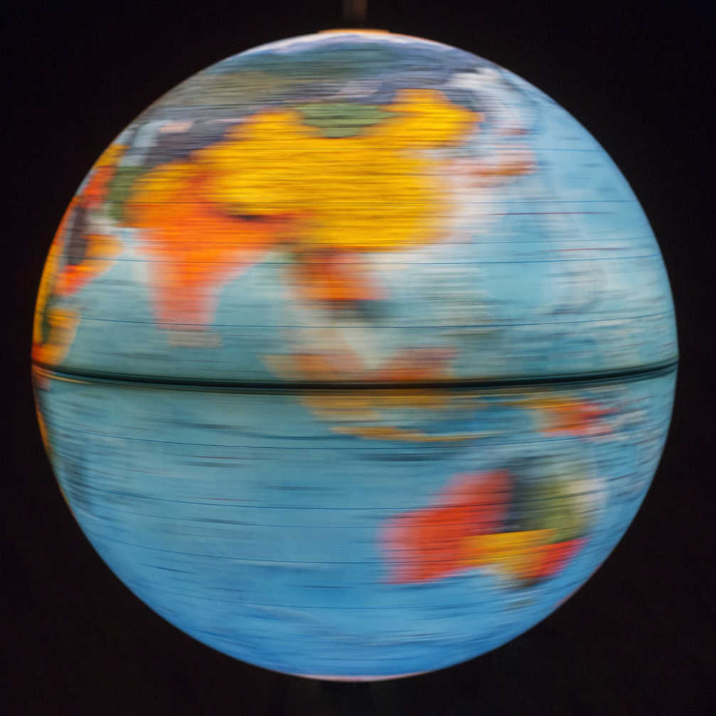Illuminated Globe From Inside Spinning Colourful