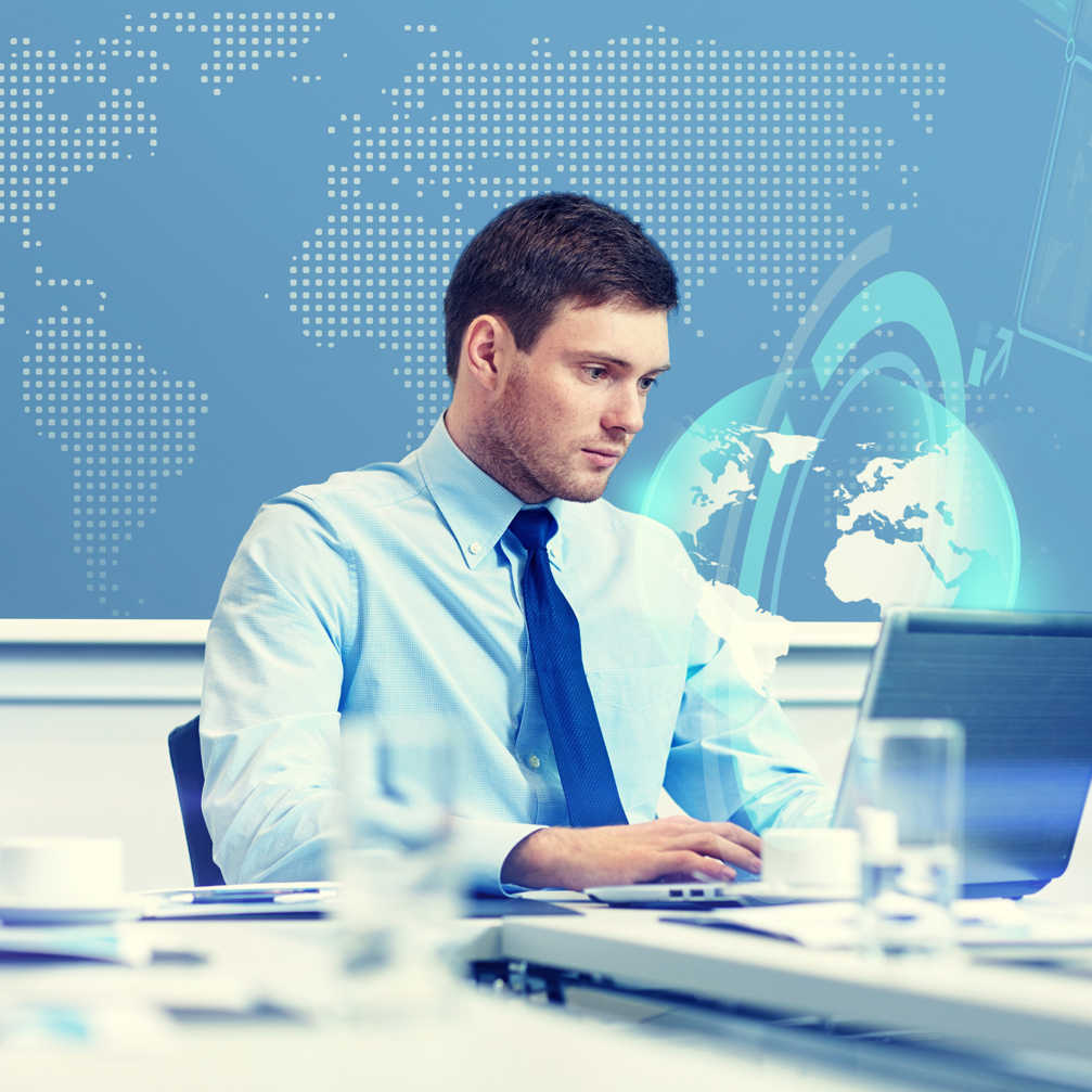 Businessman With Laptop Working In Office