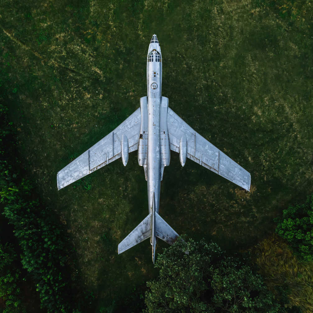 Old Plane In The Forest Aerial Top Down View