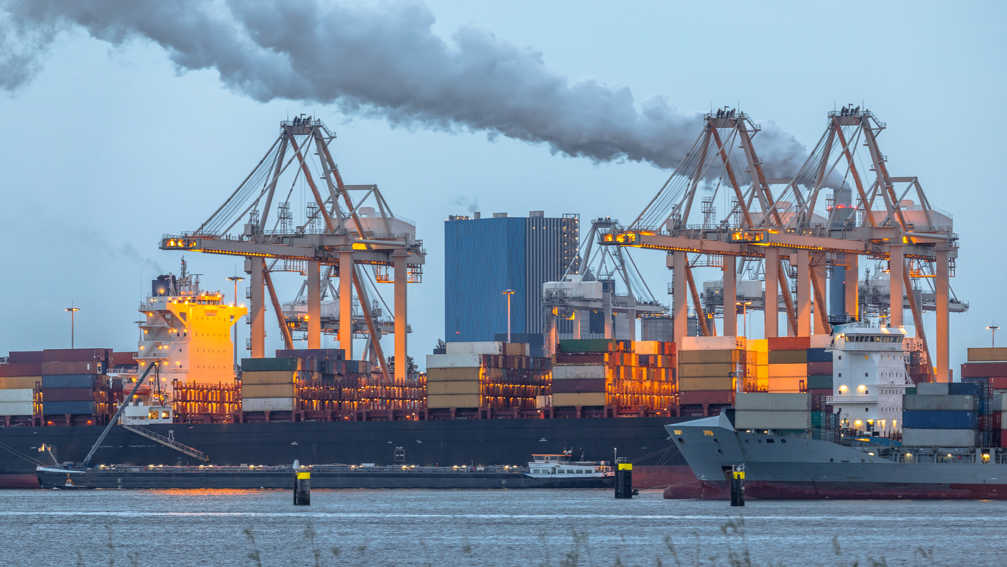 Container Ships Loading At Port Of Rotterdam