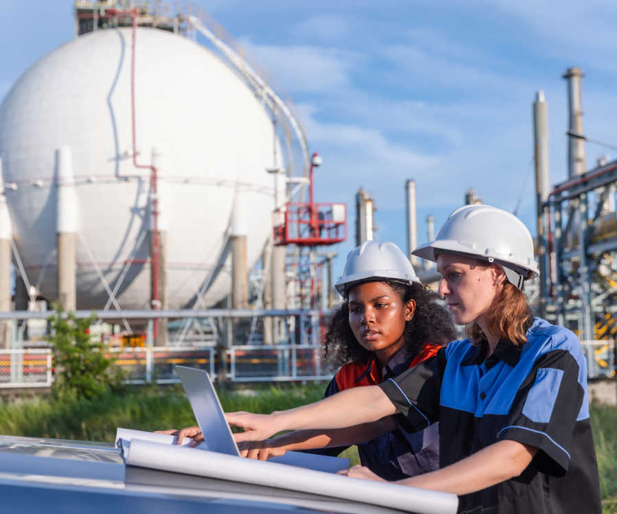 Two Female Engineers Analyzing Project Blueprints 2024 12 07 23 37 48 Utc