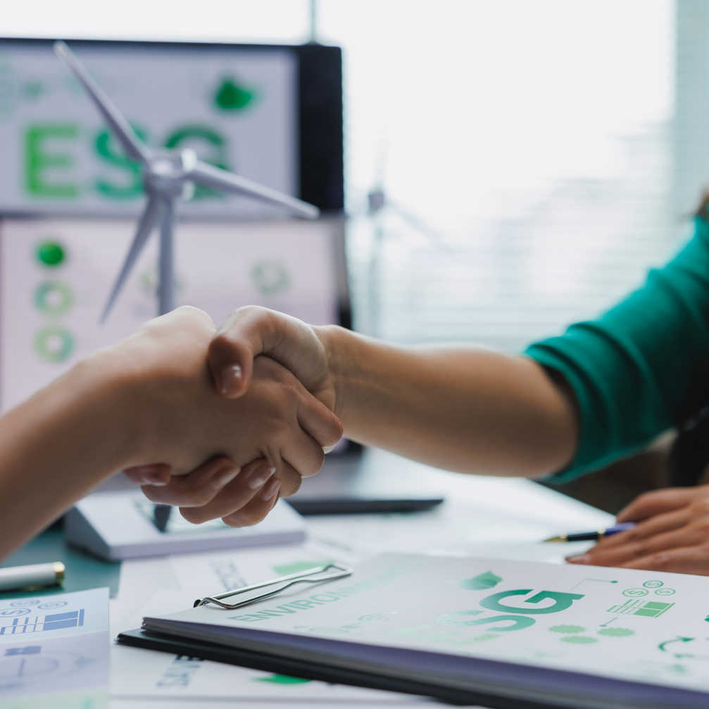 Businesswomen Shaking Hands On Esg Agreement